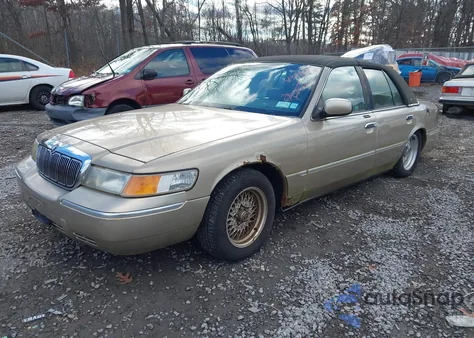 2000 Mercury Grand Marquis Ls z USA, uszkodzony, nr VIN 2MEFM75W1YX669068